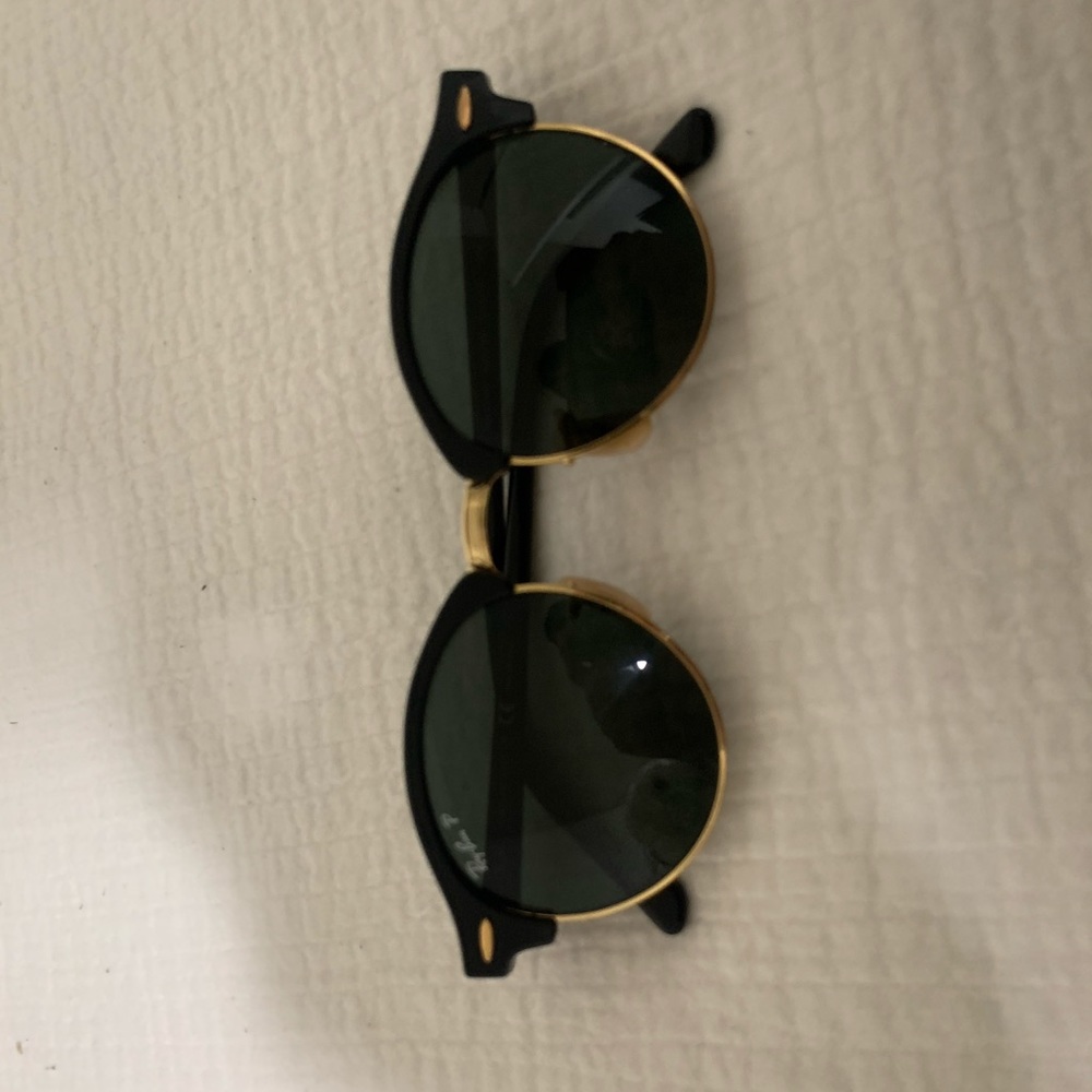 Raybans roundmasters.